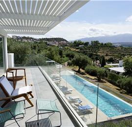 5 bedroom luxury villa with infinity pool, sea views and tennis court near Chania, sleeps 10